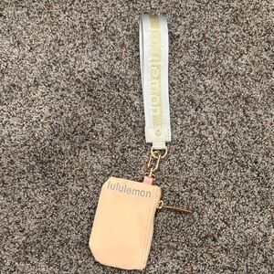 Lululemon Peach pouch Wristlet with grey and Gold Strap